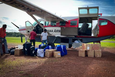 Tons of life-saving assistance are flown in on small planes before being trucked to some communities and transported by boat to others.