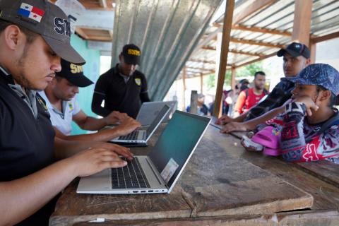 Migrants line up at Bajo Chiquito indigenous community for registration after braving the dangerous Darien Gap between Colombia and Panama.